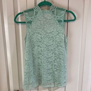 NWT never worn teal lace Cable & Gauge women’s top. Beautiful sheer shoulders.